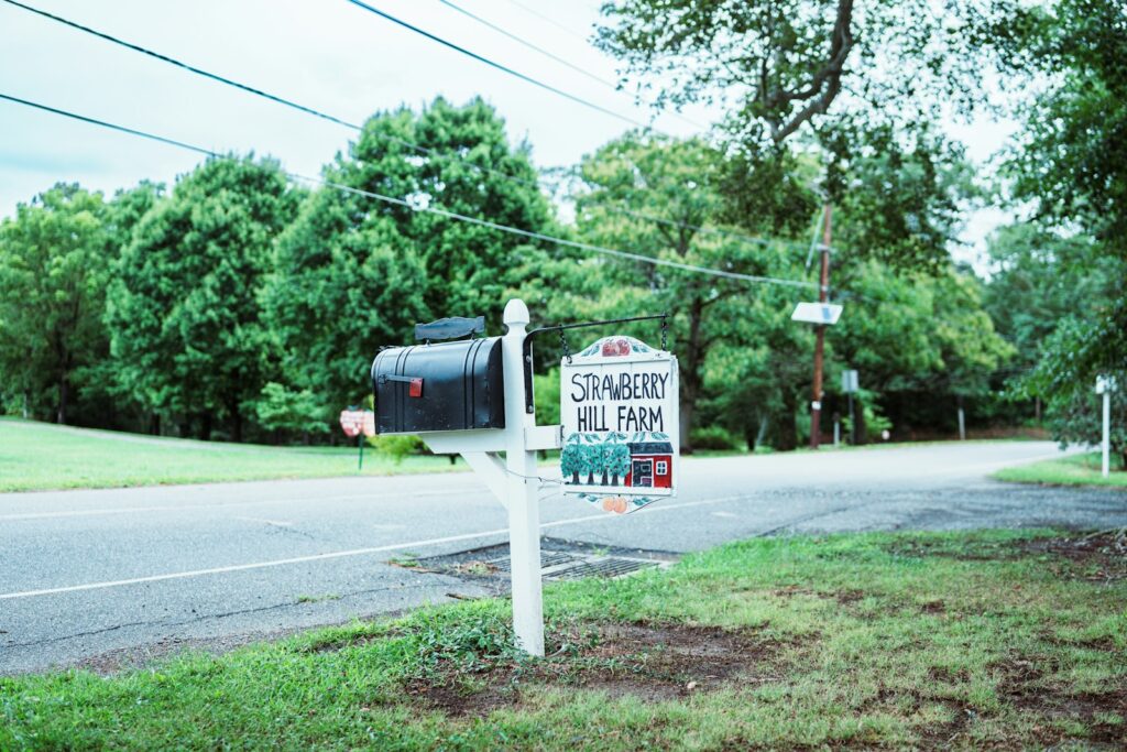 Mailbox and sign for strawberry hill farm